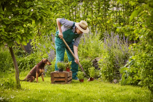 First aid kit and emergency response items laid out for garden crew